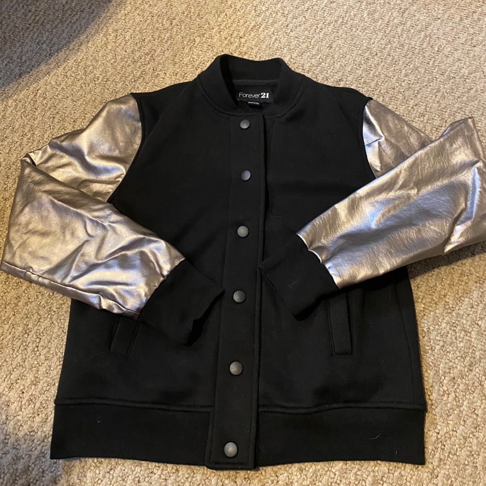 Black and metallic sleeved jacket